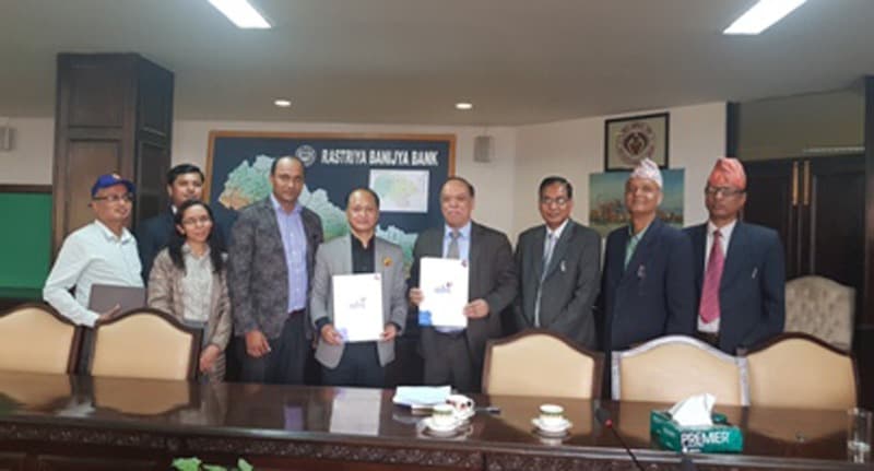 राष्ट्रिय वाणिज्य बैंक र नेशनल बैंकिङ ईन्स्टिच्यूटबीच वित्तीय साक्षरता कार्यक्रम सम्बन्धी सम्झौता