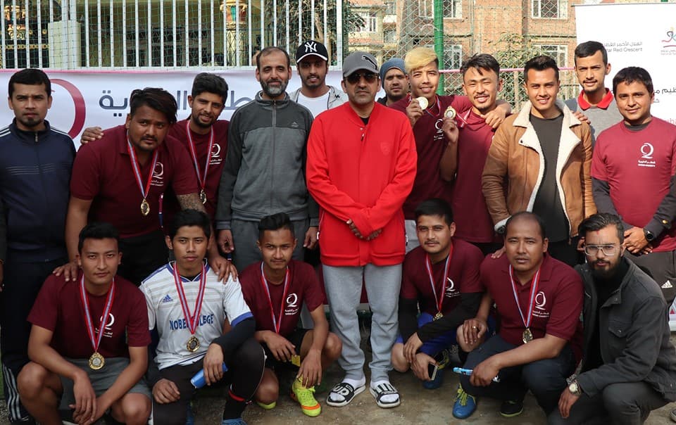 कतारको राष्ट्रिय खेलकुद दिवसमा फुटवल प्रतियोगिता आयोजना, व्रिटिश राजदुतावासले उचाल्यो ट्रफि