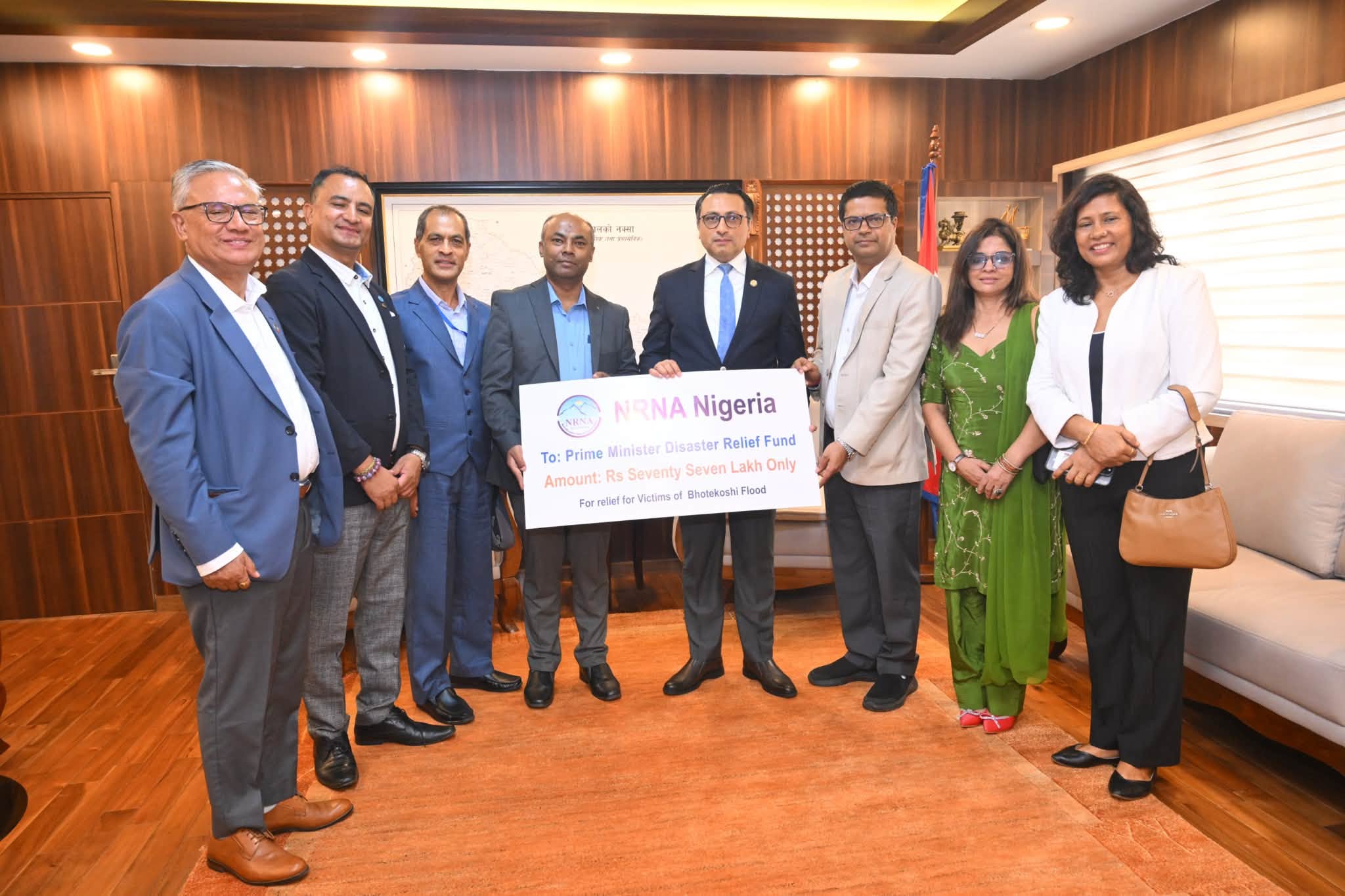 भोटेकोशी बाडिपिडितको पुनर्स्थापनाको लागी एनआरएन नाइजेरिया र एनआरएन घानाको  तर्फबाट रु ८० लाख बराबरको चेक हस्तानतरण